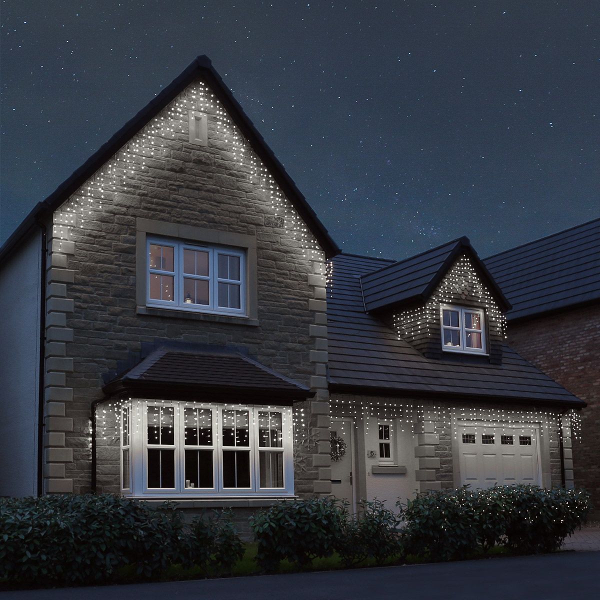Cool White Icicle Lights Outline Modern House Rooflines — Icicle Christmas Lights