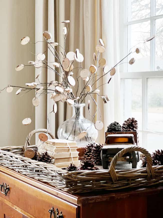 Cozy Farmhouse Vignette with Decorative Branches and Vintage Truck — Winter Decor After Christmas