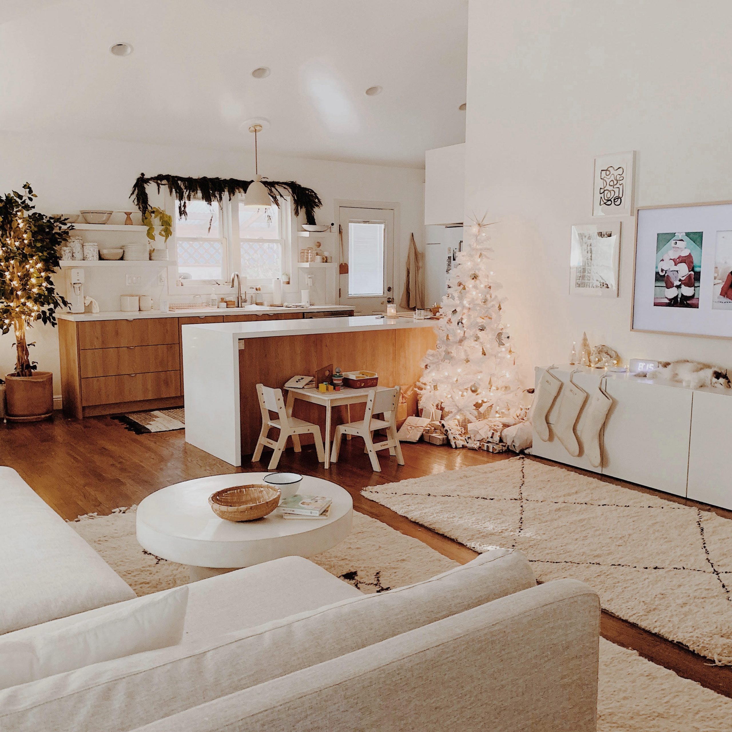 Open-Plan Modern Living and Kitchen with Minimalist White Christmas Tree — Modern Christmas Decor