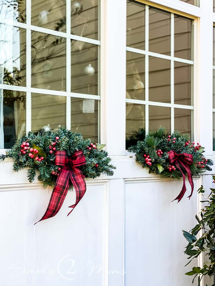 Traditional Christmas Swags with Pine, Red Berries, and Plaid Ribbons — Christmas Window Decor Outdoor