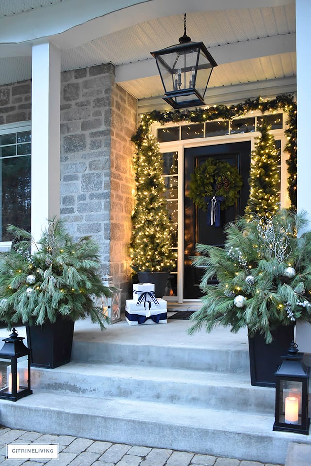 Evening Christmas Porch with Illuminated Planters and Lights — Farmhouse Christmas Porch