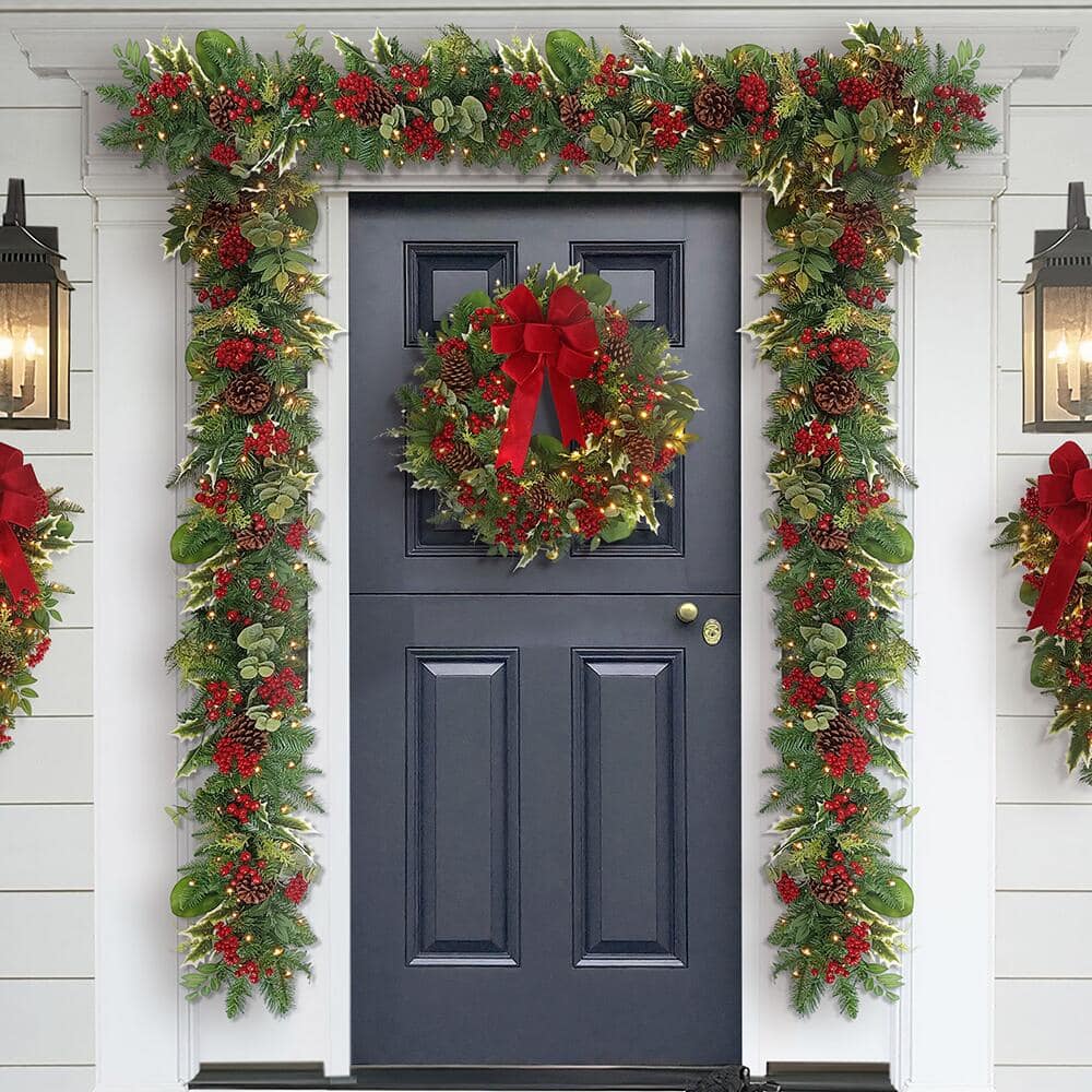 Classic Wreath with Red Bow on Dark Blue Door and Garland Classic Wreath with Red Bow on Dark Blue Door and Garland — Christmas Wreath