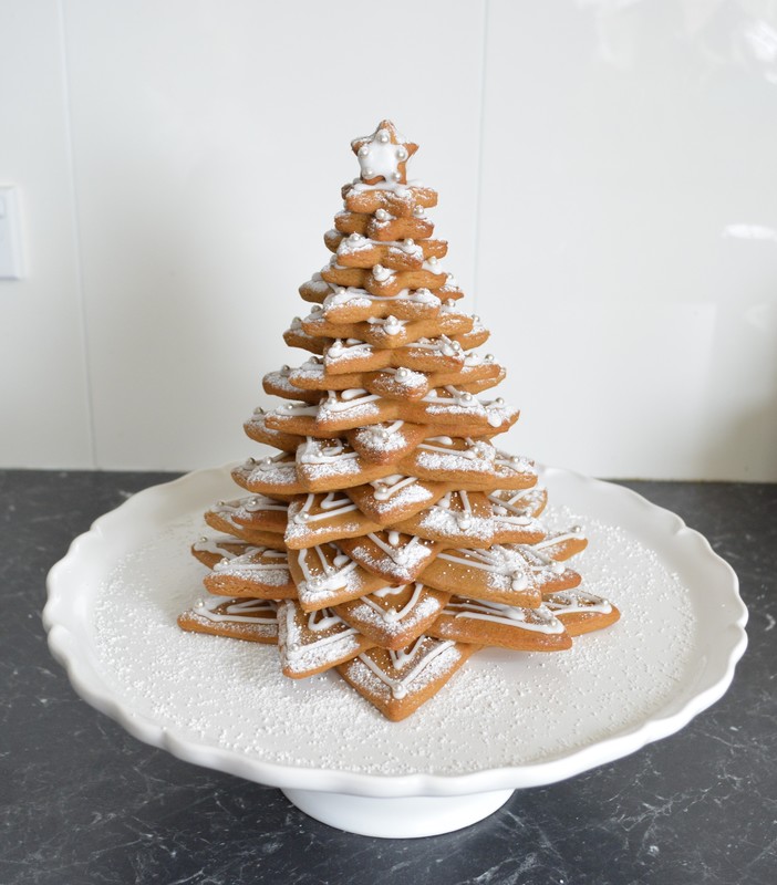 Modern Tiered Gingerbread Christmas Tree with Powdered Sugar Dusting Modern Tiered Gingerbread Christmas Tree with Powdered Sugar Dusting