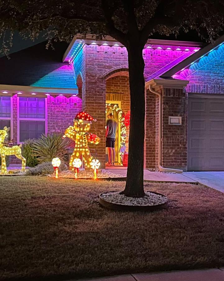 Vibrant Gingerbread Man and House Outline Lights Vibrant Gingerbread Man and House Outline Lights — Christmas Light Display Ideas