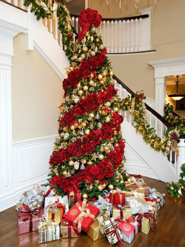 Grand Entryway with a Red and Gold Decorated Christmas Tree and Gifts Grand Entryway with a Red and Gold Decorated Christmas Tree and Gifts — Red and Gold Christmas Decor