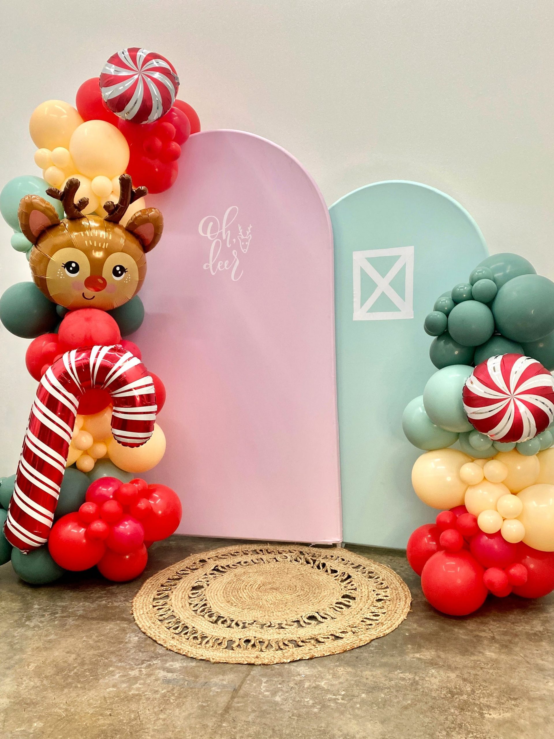 Festive Balloon Garland with Reindeer and Candy Cane Accents — Christmas Balloon Garland
