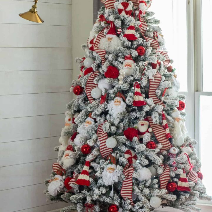 Living Room Traditional Christmas Tree with Santa Ornaments and Red/White Striped Ribbon Living Room Traditional Christmas Tree with Santa Ornaments and Red/White Striped Ribbon — Red and White Christmas Tree