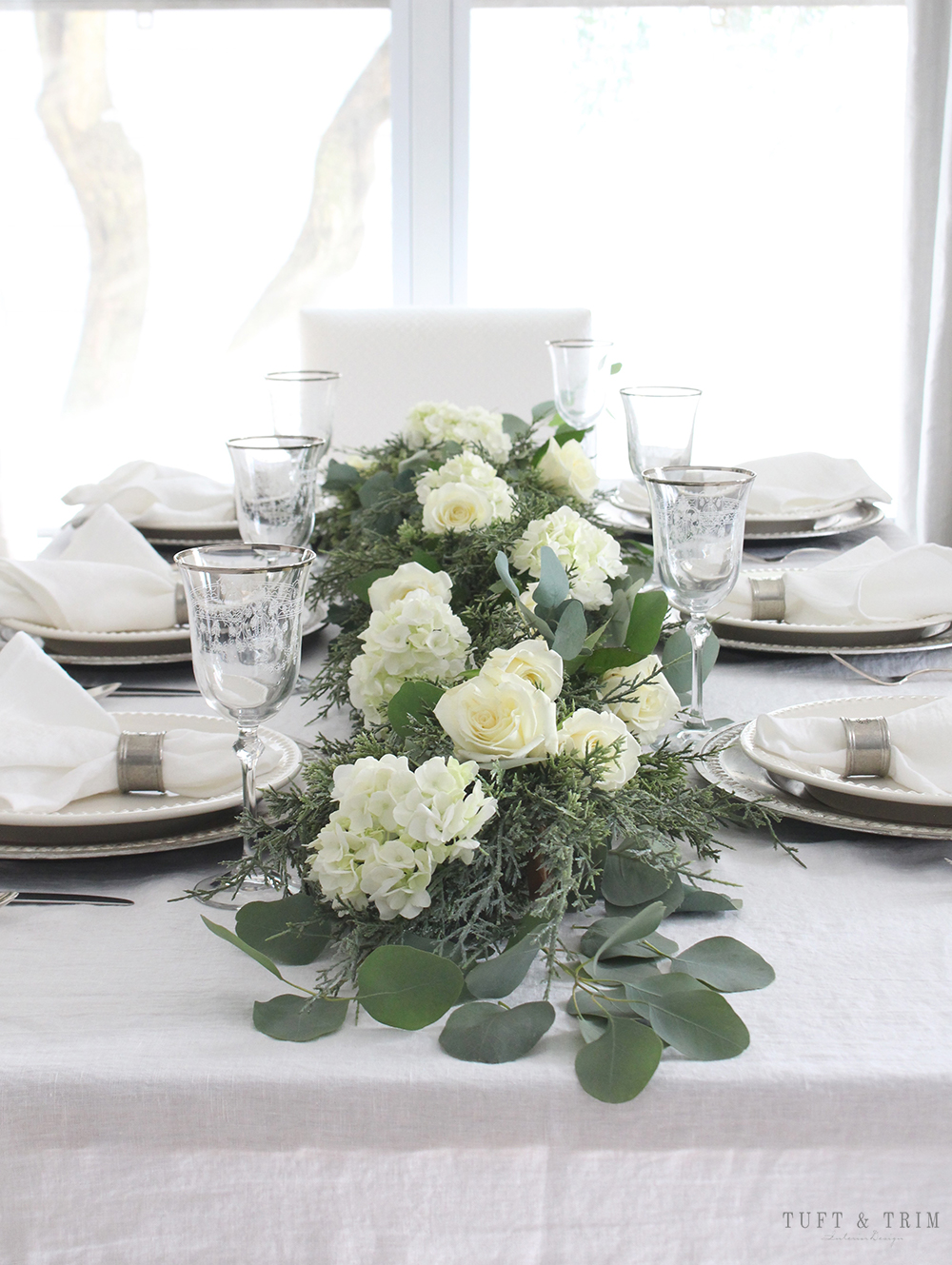 Long Runner of White Florals and Lush Greenery Long Runner of White Florals and Lush Greenery — Christmas Wedding Centerpiece