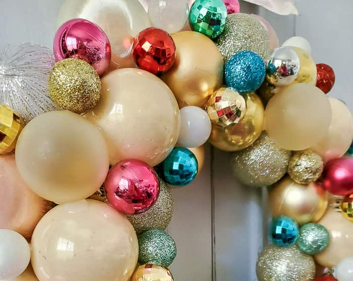 Vibrant Mix of Textures and Colors in a Festive Ornament Wreath Vibrant Mix of Textures and Colors in a Festive Ornament Wreath