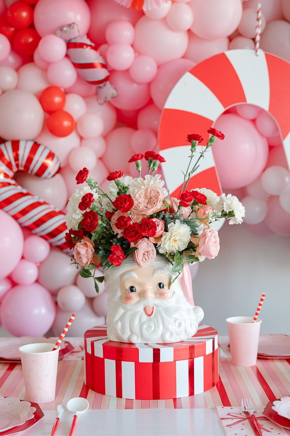 Whimsical Santa Vase Centerpiece for a Candy-Themed Party — Christmas Party Decor