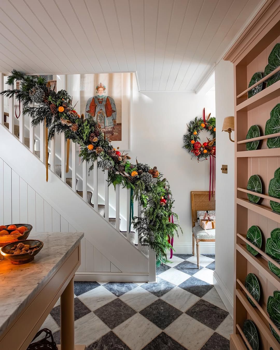 Natural Garland with Oranges and Pinecones, Paired with a Festive Wreath Natural Garland with Oranges and Pinecones, Paired with a Festive Wreath — Christmas Staircase Decor