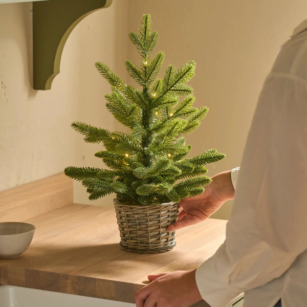 Cozy Kitchen Counter Tree in a Wicker Basket Cozy Kitchen Counter Tree in a Wicker Basket — Tabletop Christmas Tree Decor