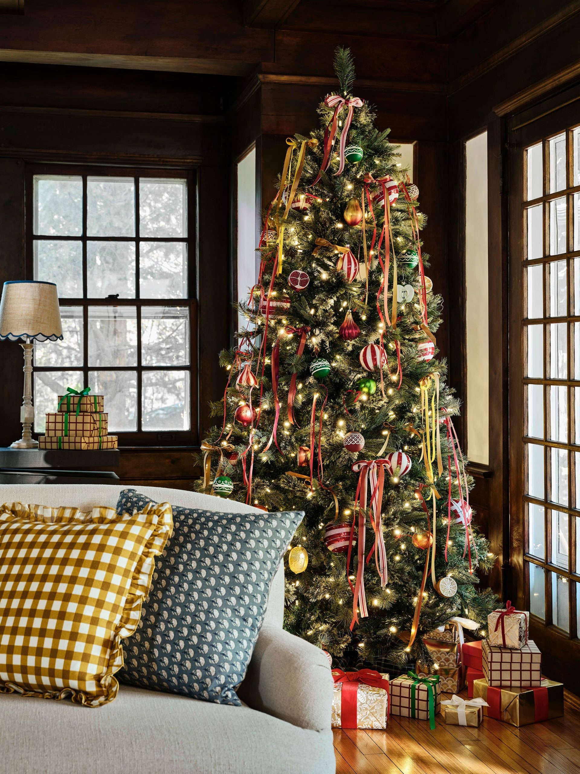 Traditional Living Room with a Christmas Tree Draped in Colorful Ribbons — Vertical Ribbon Christmas Tree
