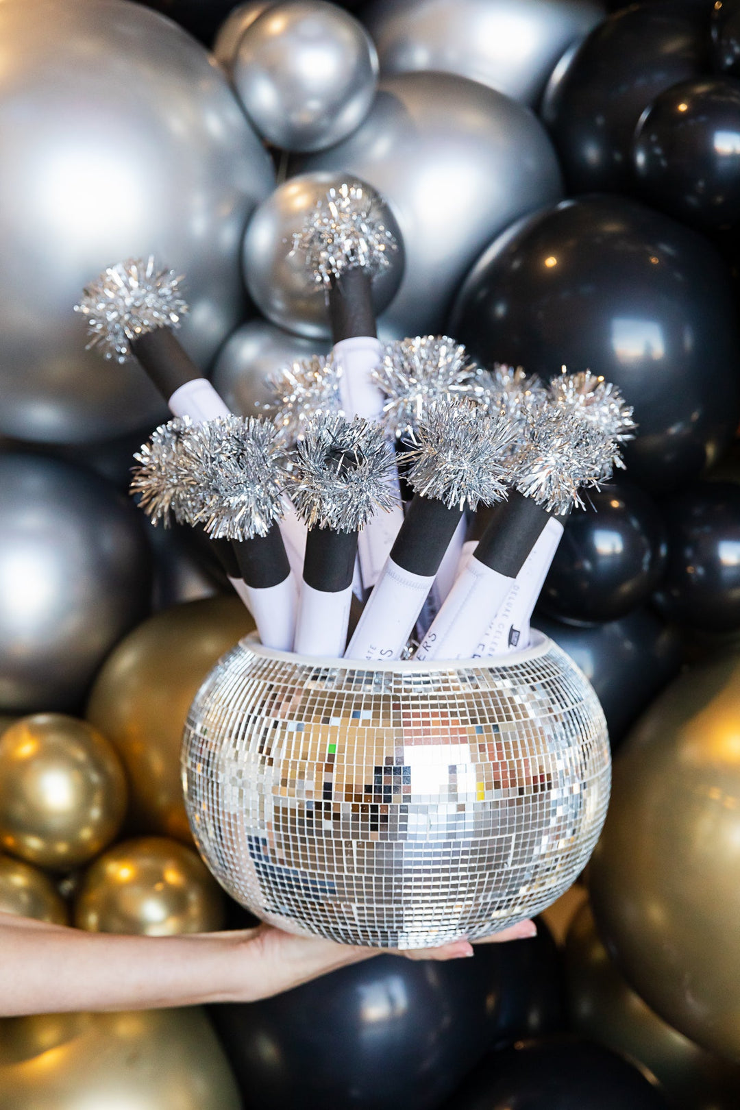 Glamorous Disco Ball Vase Filled with Party Favors Glamorous Disco Ball Vase Filled with Party Favors — New Years Eve Party 2027