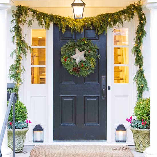 Classic Black Door with Greenery Garland and Subtle String Lights Classic Black Door with Greenery Garland and Subtle String Lights — Christmas Front Door Decor