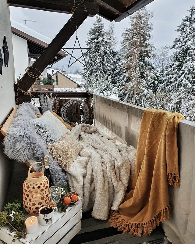 Hygge Balcony with Plush Textiles and Lanterns Hygge Balcony with Plush Textiles and Lanterns — Christmas Balcony Decor