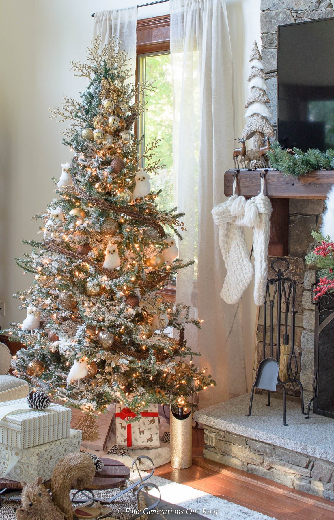 Flocked Farmhouse Tree with Owl Ornaments by Stone Fireplace — Farmhouse Christmas Tree