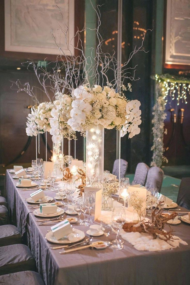 Modern Minimalist Table with Tall White Floral Arrangements Modern Minimalist Table with Tall White Floral Arrangements — Christmas Wedding Decor