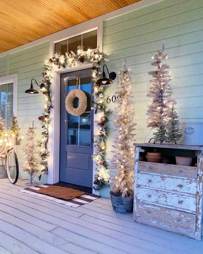 Whimsical Farmhouse Porch with Sparkling Christmas Trees and Dresser — Farmhouse Christmas Porch