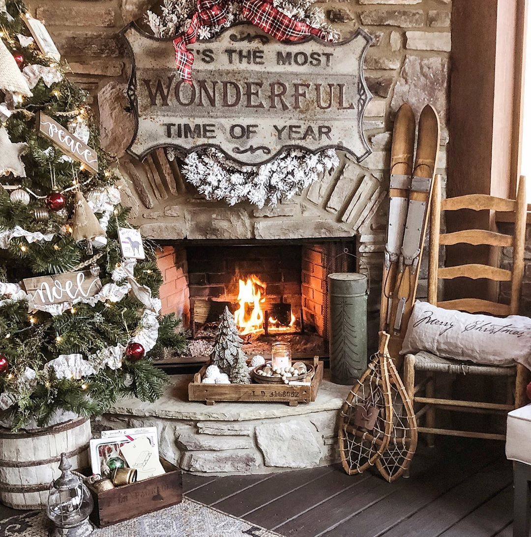 Stone Fireplace with Vintage Skis and Festive Sign — Rustic Christmas Decor