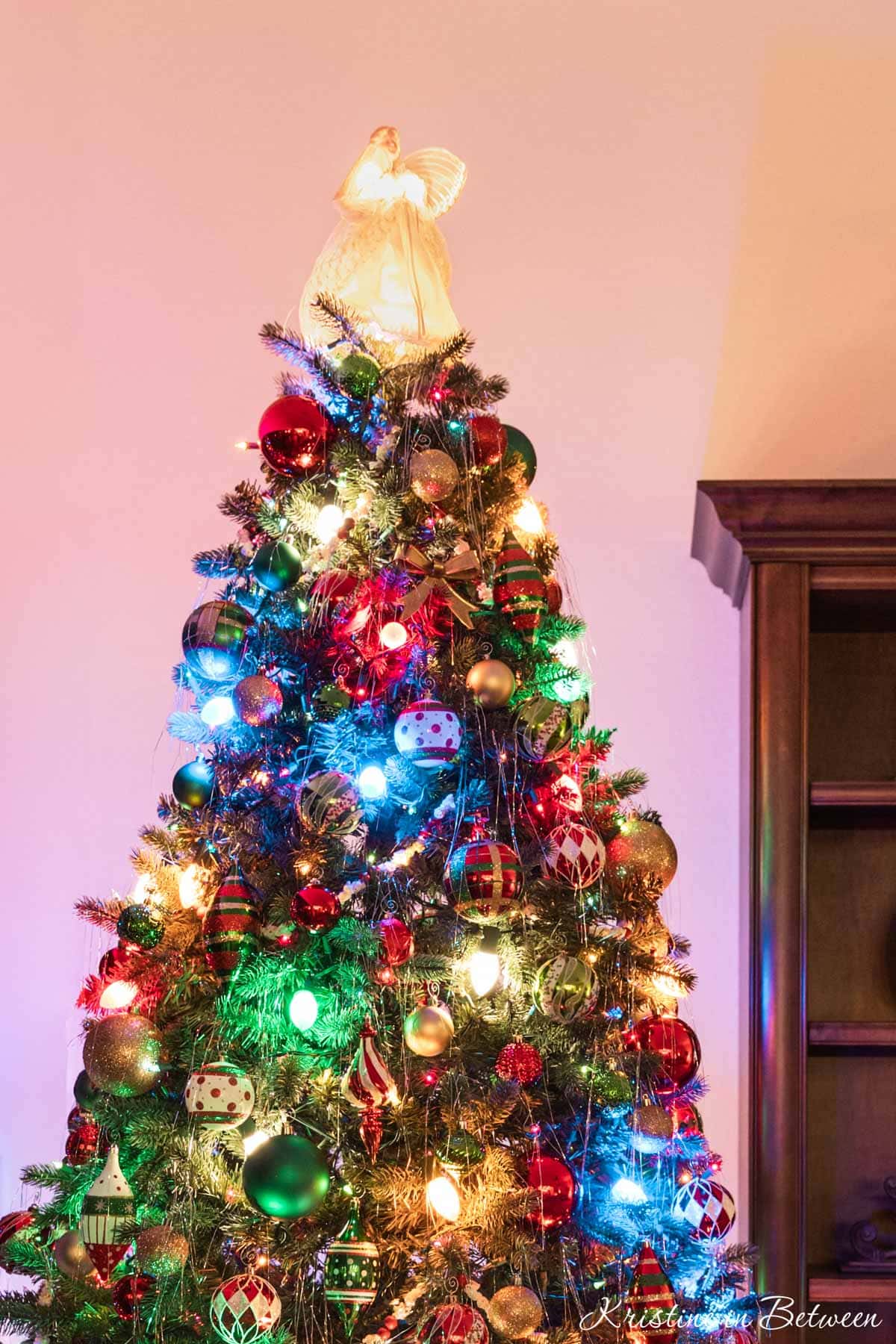 Close-up of a Traditional Christmas Tree with Abundant Ornaments Close-up of a Traditional Christmas Tree with Abundant Ornaments — Christmas Tree with Colored Lights