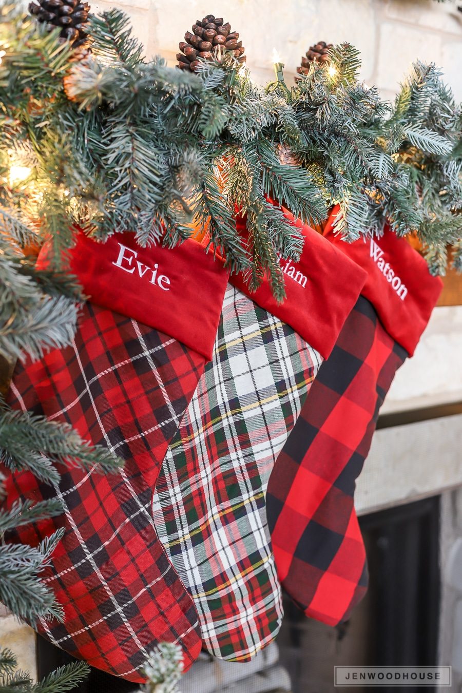Close-Up of Farmhouse Mantel with Plaid Stockings and Fairy Lights Close-Up of Farmhouse Mantel with Plaid Stockings and Fairy Lights — Farmhouse Christmas Mantel
