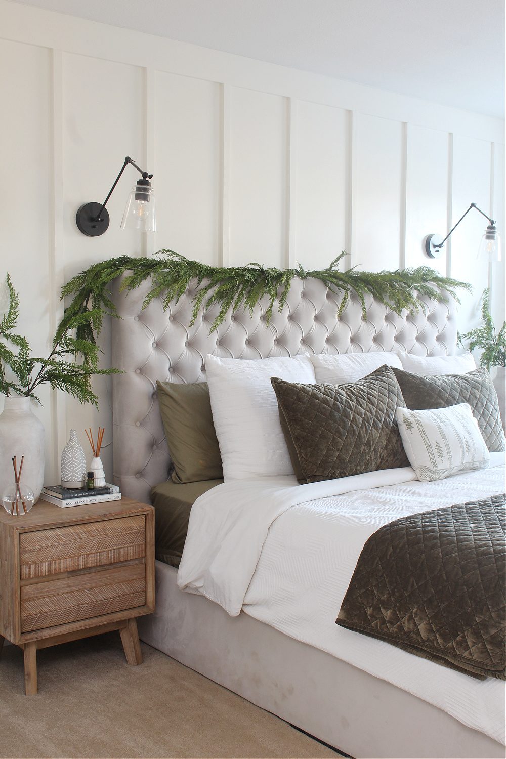 Modern Farmhouse Bedroom with Greenery Garland on Tufted Headboard Modern Farmhouse Bedroom with Greenery Garland on Tufted Headboard — Christmas Bedroom Decor