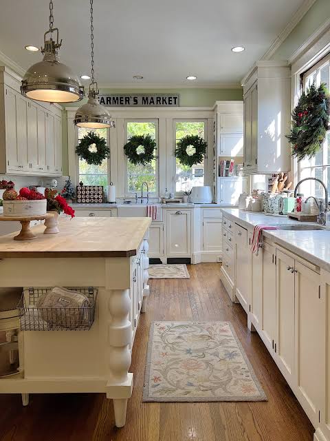 Expansive White Farmhouse Kitchen with Christmas Wreaths — Farmhouse Christmas Kitchen