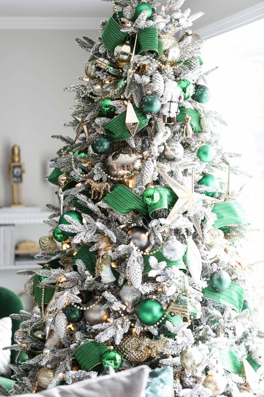 Traditional Flocked Tree with Green Ribbon and Gold Accents — Flocked Christmas Tree Decor