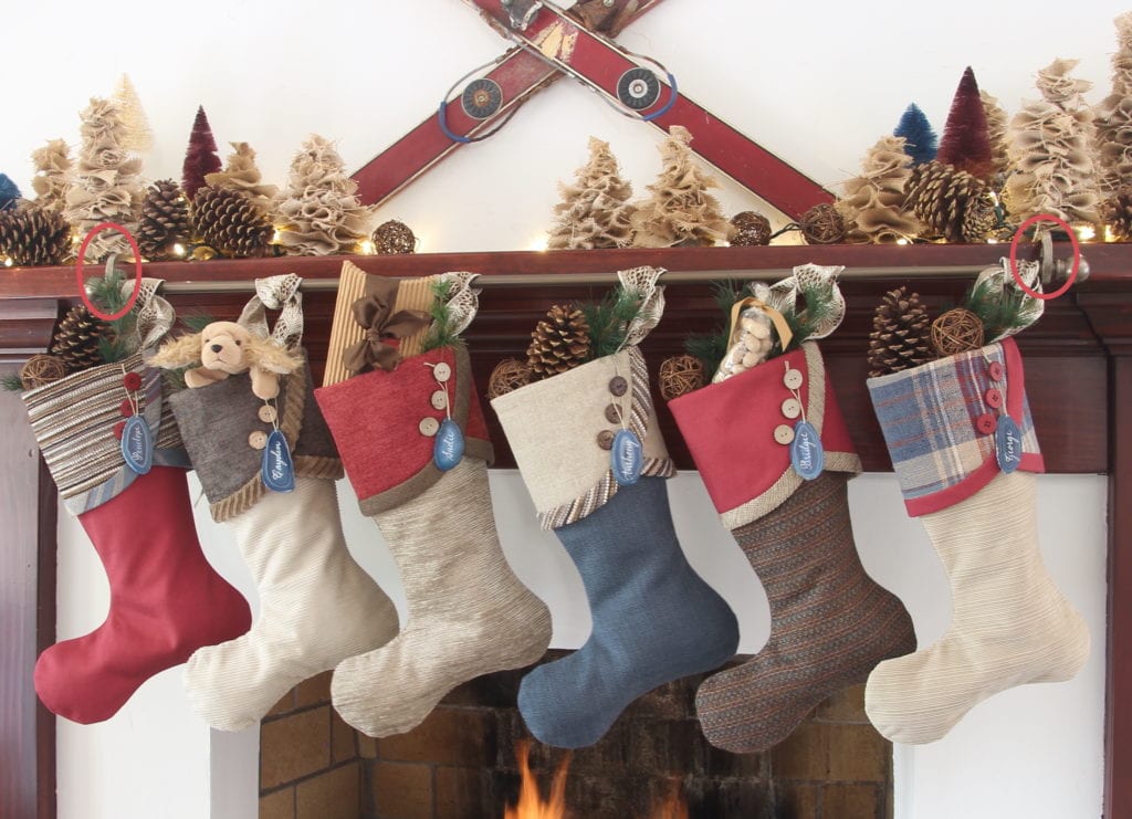 Eclectic Patterned Stockings on a Wooden Mantel — Christmas Stockings Display