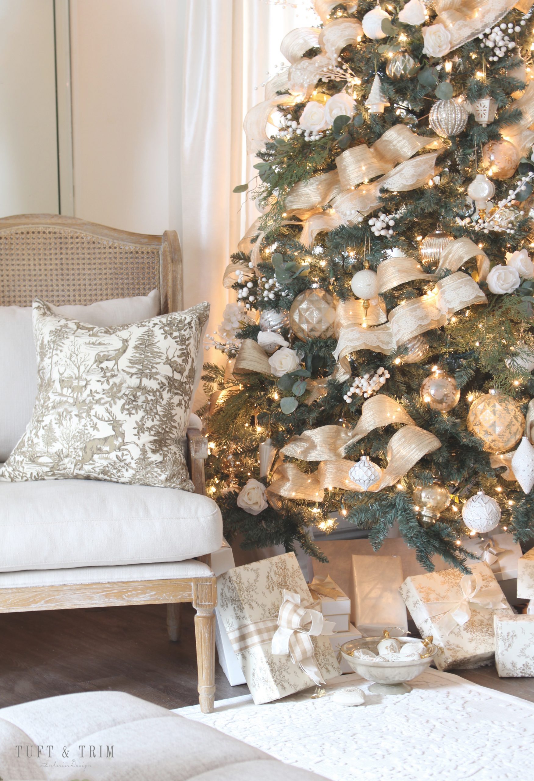 Tree And Seating Area Cozy living room vignette with a white and gold Christmas tree and armchair Tree And Seating Area Cozy living room vignette with a white and gold Christmas tree and armchair — Gold and White Christmas