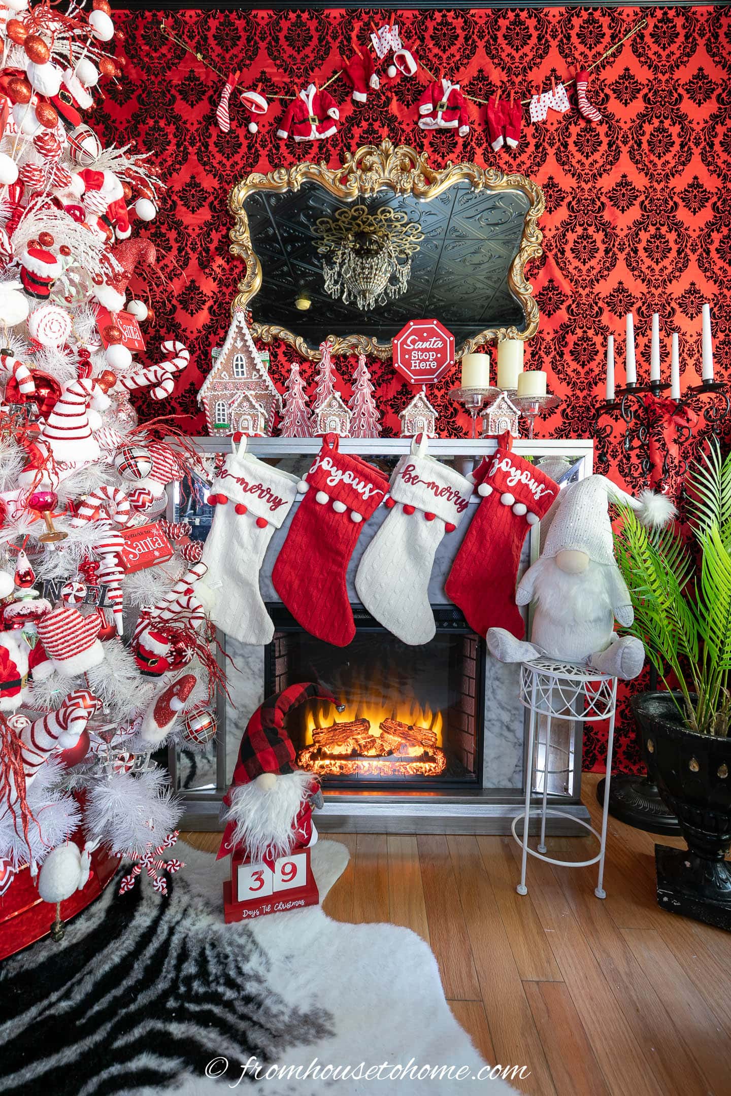 Living Room Whimsical White Christmas Tree with Red and White Candy Cane Ornaments and Gnomes Living Room Whimsical White Christmas Tree with Red and White Candy Cane Ornaments and Gnomes — Red and White Christmas Tree