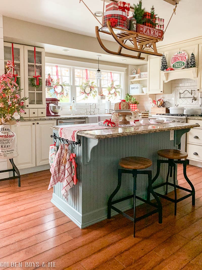 Farmhouse Kitchen Island with Whimsical Hanging Sled — Farmhouse Christmas Kitchen
