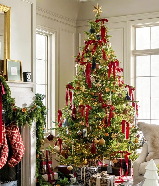 Spacious Living Room Corner with Grand Christmas Tree and Fireplace — Red and Green Christmas Decor
