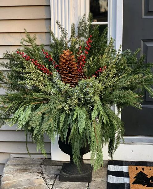 Symmetrical Planters Flanking a Decorated Doorway Symmetrical Planters Flanking a Decorated Doorway — Christmas Porch Planters
