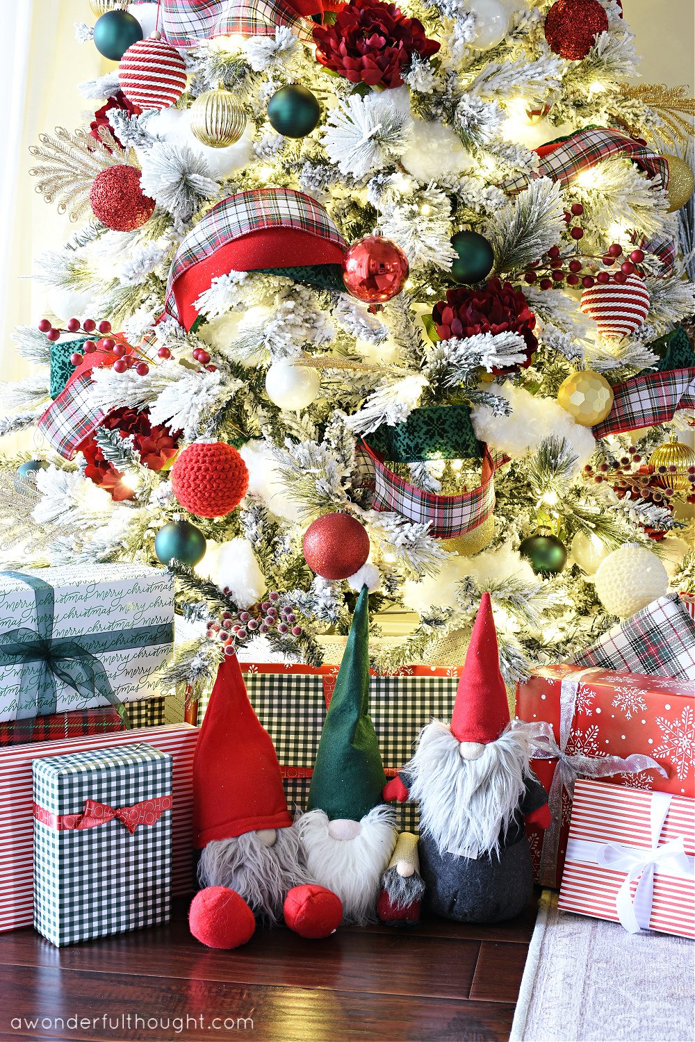 Flocked Christmas Tree with Red and Green Plaid Ribbon and Gnomes — Red and Green Christmas Decor