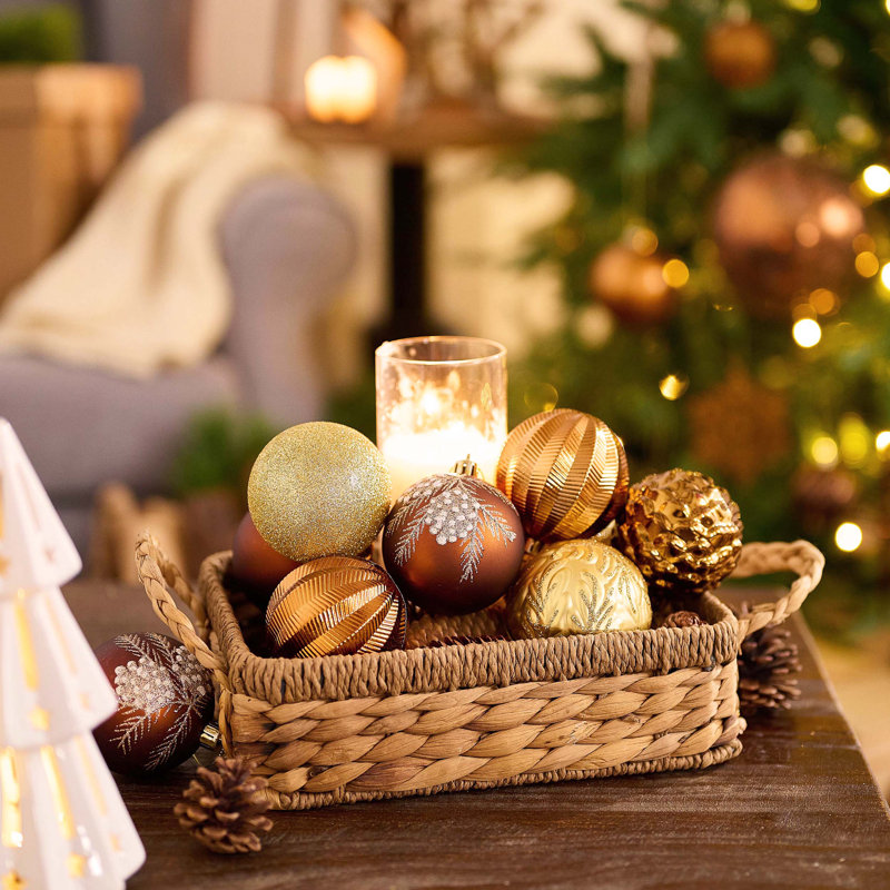 Display gold Christmas ornaments in a rustic wicker basket Display gold Christmas ornaments in a rustic wicker basket — Gold Christmas Decor