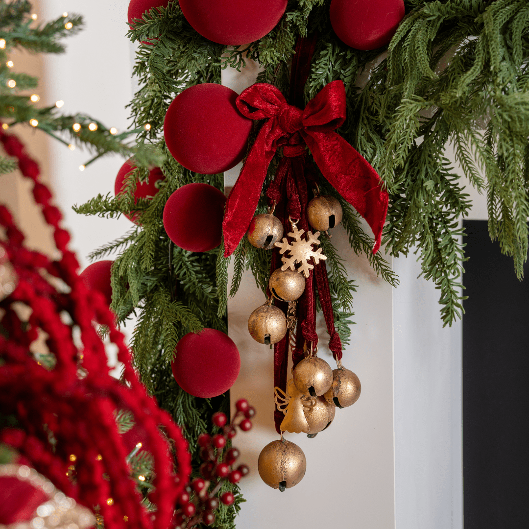 Close-Up of a Burgundy Velvet Christmas Garland on a Mantel Close-Up of a Burgundy Velvet Christmas Garland on a Mantel — Burgundy Christmas Decor