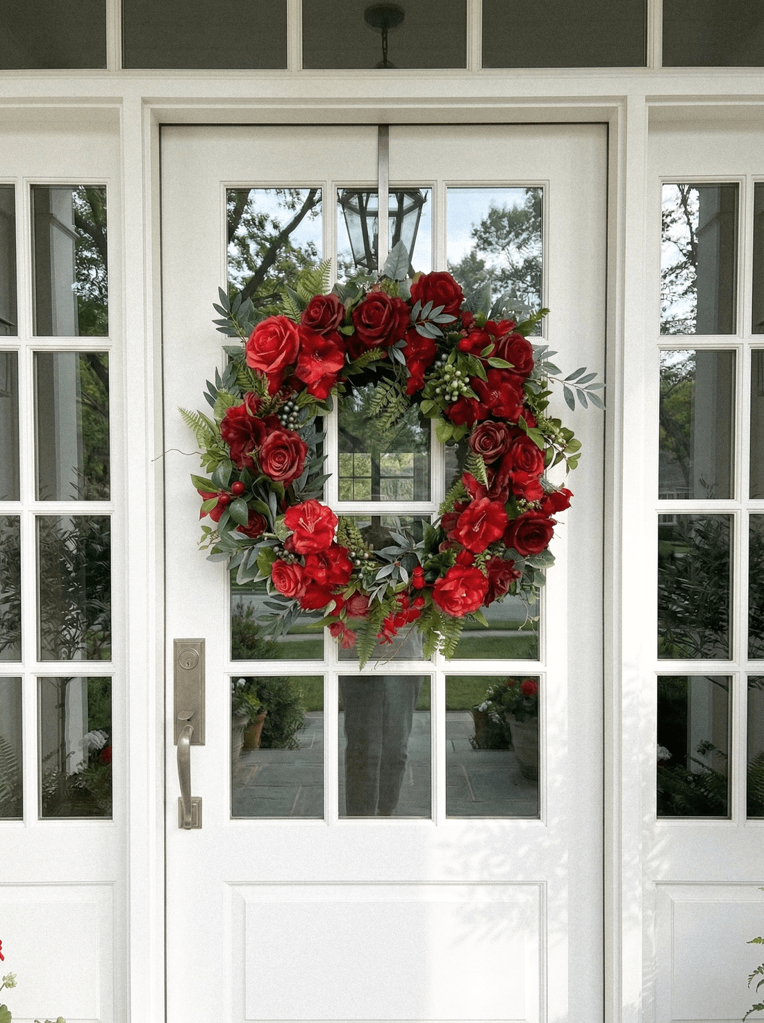 Festive Burgundy Floral Wreath on White Double Doors Festive Burgundy Floral Wreath on White Double Doors — Burgundy Christmas Decor