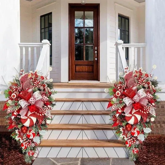 Festive Porch Steps Decorated with Large Candy Cane Ornaments — Candy Cane Christmas Decor