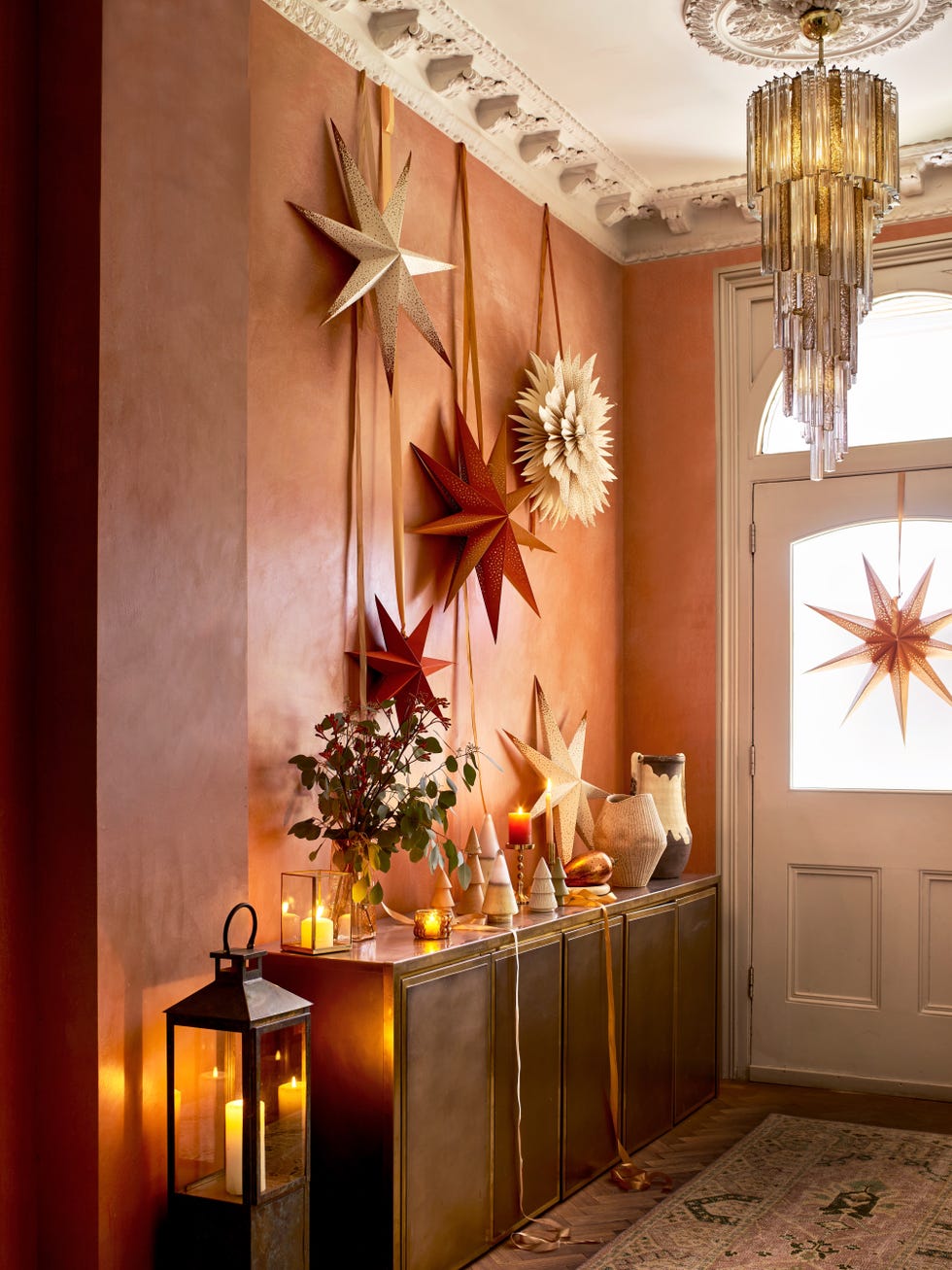 Chic Hallway with Gold Starbursts and Metallic Console Chic Hallway with Gold Starbursts and Metallic Console — Christmas Entryway Decor