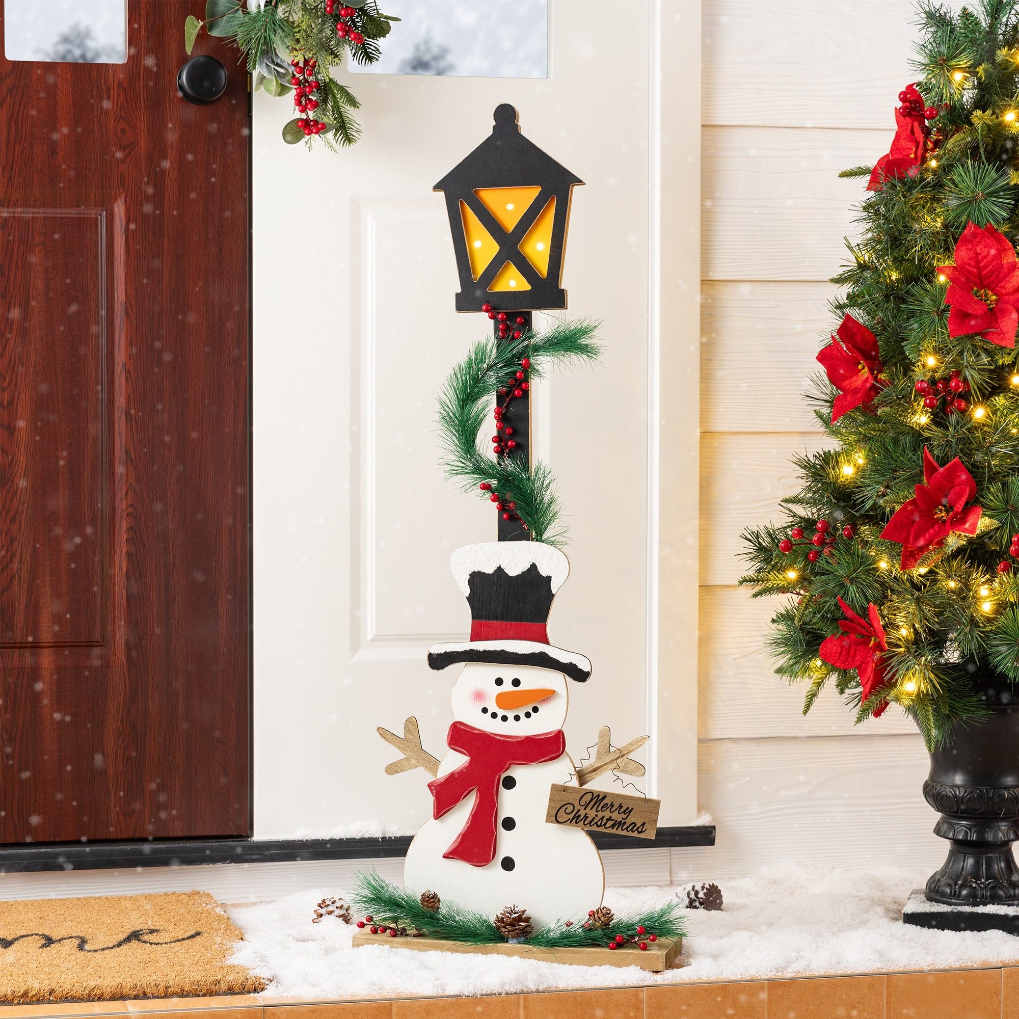 Whimsical Wooden Snowman Decoration on Snowy Porch — Christmas Porch Decor