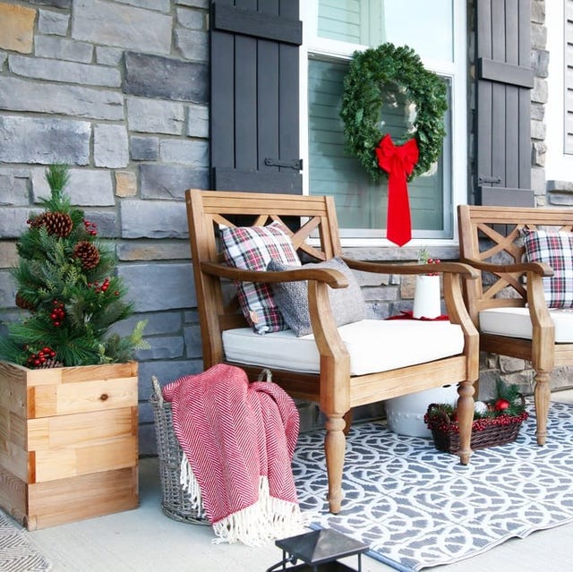 Cozy Farmhouse Porch Seating with Plaid Cushions and Mini Tree — Farmhouse Christmas Porch