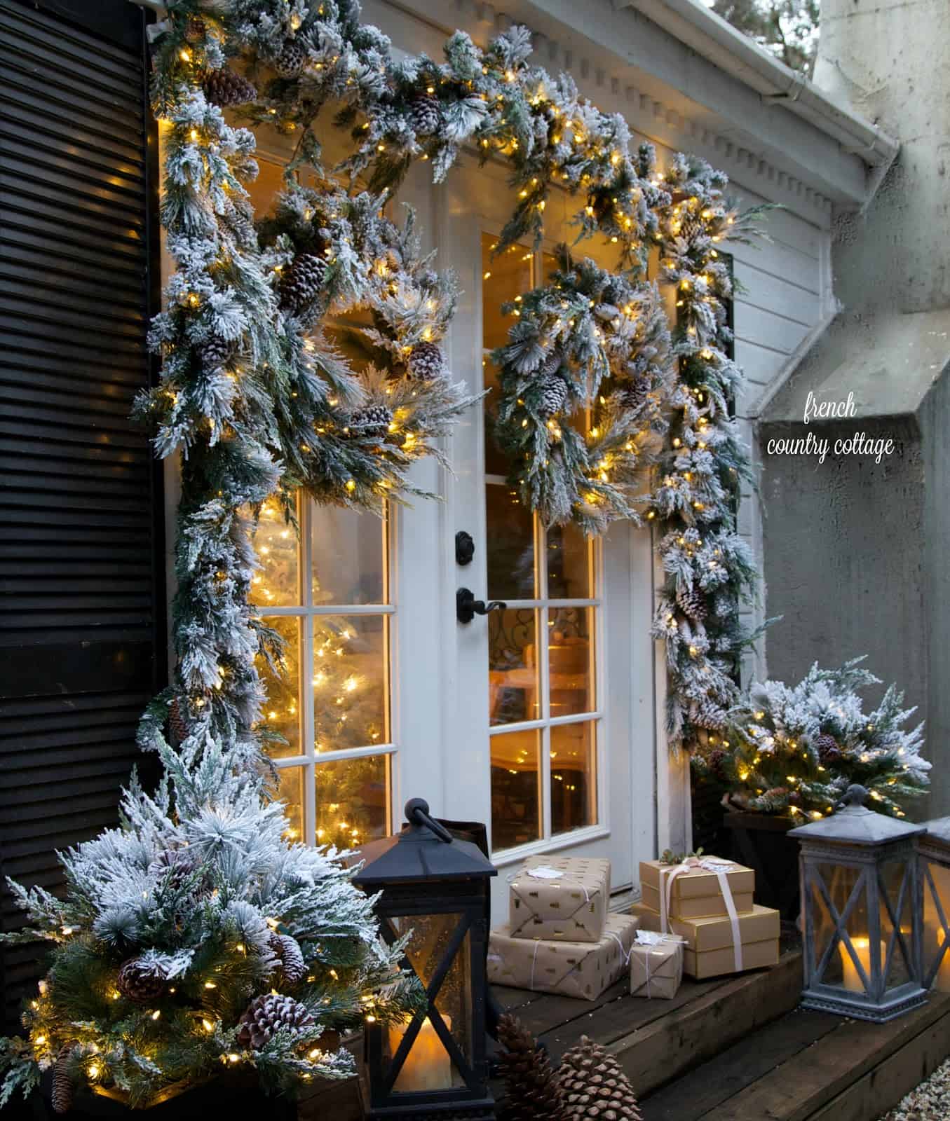 Rustic Porch with Frosted Greenery and String Lights Rustic Porch with Frosted Greenery and String Lights — Outdoor Christmas Lights