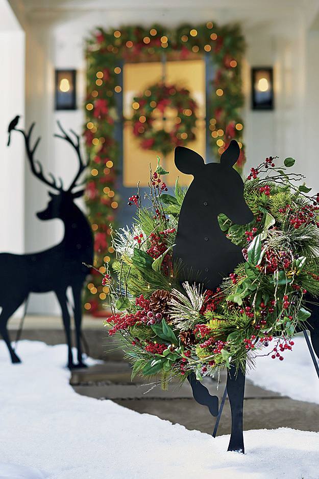Rustic Porch with Potted Evergreen Trees and Abundant Pine Garland — Simple Christmas Outdoor Decor