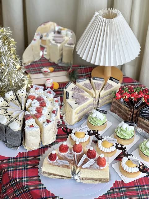 Traditional Plaid Christmas Dessert Table with Sliced Cakes Traditional Plaid Christmas Dessert Table with Sliced Cakes
