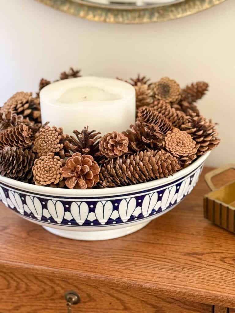 Rustic Pinecone and Candle Centerpiece in a Blue and White Bowl — Winter Decor After Christmas