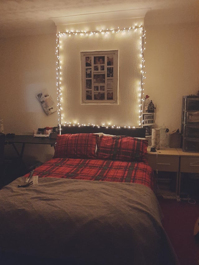 Functional Bedroom with Photo Collage and Cool White Fairy Lights — Christmas Fairy Lights Headboard