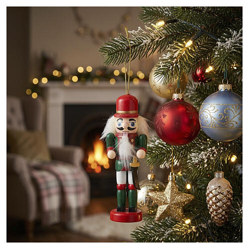 Wooden Nutcracker Ornament on a Lighted Christmas Tree Wooden Nutcracker Ornament on a Lighted Christmas Tree — Nutcracker Christmas Tree