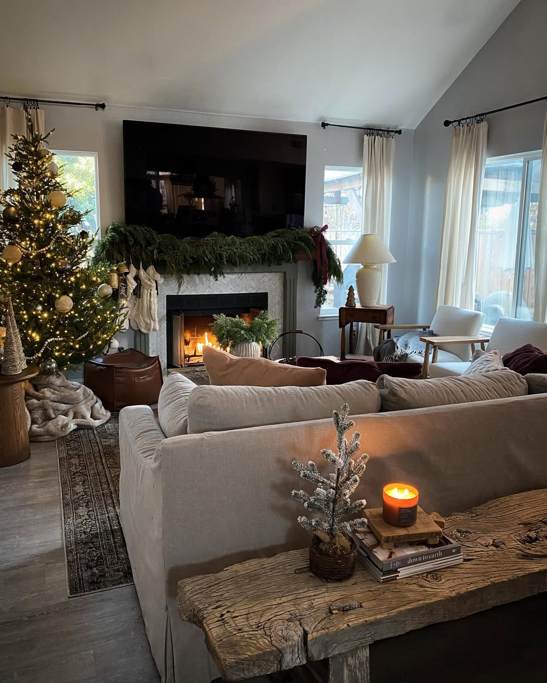Festive Fireplace with Stockings and Abundant Christmas Tree Festive Fireplace with Stockings and Abundant Christmas Tree — Cozy Christmas Living Room